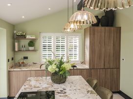 A kitchen with countertop and cabinets at Low House Cottage Ayside near Newby Bridge
