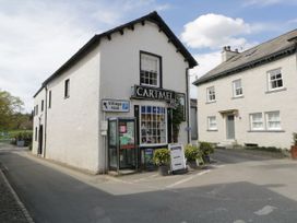 A shop with a parking sign in front at Low House Cottage Ayside near Newby Bridge