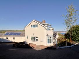 A house with solar panels and garden at Hawksdown in Lyme Regis