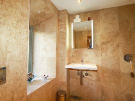 A bathroom with a sink and mirror at Kerslake House Crafthole