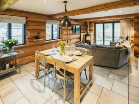 A dining room with a table and chairs at The Lookout in Addingham