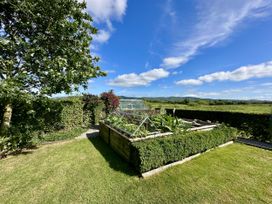 A garden with a raised bed containing vegetables at Seeview in Charleville
