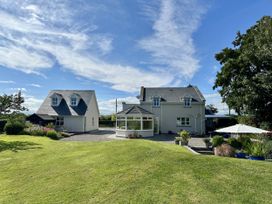 A house and shed with gardens at Seeview in Charleville