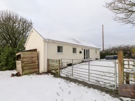 A house with snow in front at Swallow Cottage Llangefni