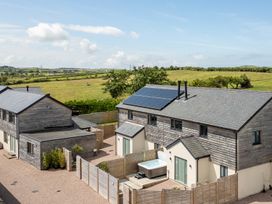 Houses with solar panels and a hot tub at Bell House in Llanfechell