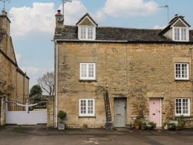A stone house with doors and windows at 23 New Church Street Tetbury