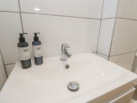 A sink with soap dispensers at Ammil Bespoke in St Ives