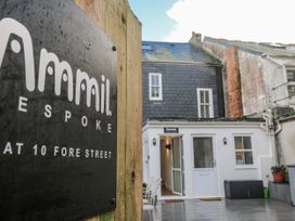 An outdoor area with a sign and entrance at Ammil Bespoke in St Ives