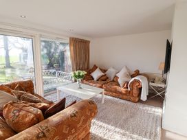 A living room with a sofa and coffee table at Three Ways South Lopham near Garboldisham