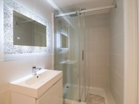 A bathroom with shower and sink at Three Ways in South Lopham near Garboldisham