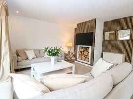 A living room with sofa and coffee table at Three Ways South Lopham near Garboldisham