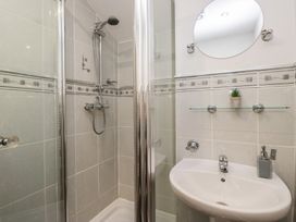 A bathroom with a shower and sink at Newlands Fell House in Newlands near Keswick