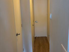 A hallway with multiple doors at Skegness Holiday Park in Skegness