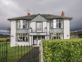 A house with windows and a balcony at Herdwick Croft in Bassenthwaite