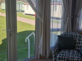 A snug with a view of caravans at Red Lion Caravan Park in Arbroath