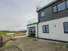 An outdoor area of a building with a gate at Pengarnedd Amlwch