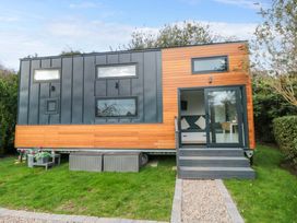 A tiny home with garden and steps at The Tiny Home 