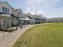 Houses with a pathway and garden at Ty Mor in Newport, Pembrokeshire