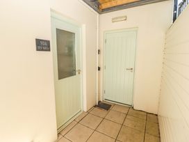 An entryway with two doors and a sign at Ty Mor in Newport, Pembrokeshire