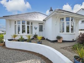A house with a front door and garden plants at Porthmeor in Wadebridge