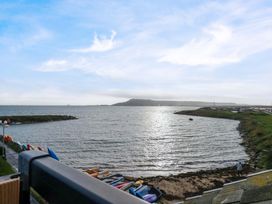 A view of water with boats and land at Still Waters in Weymouth
