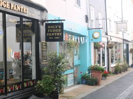 A street view of shops including Roly's Fudge Pantry at Garden Cottage at the Bowden Estate, Stoke Fleming