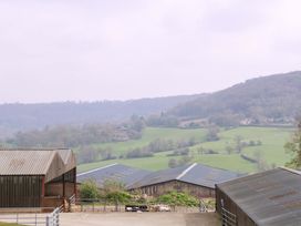 A view of farm buildings and fields at Farm View Annex in Painswick