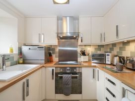 A kitchen with appliances and utensils at The Spinney near Milnthorpe