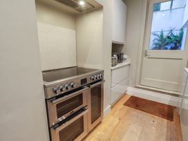 A kitchen with an oven and countertop at South Villa Sandsend near Whitby