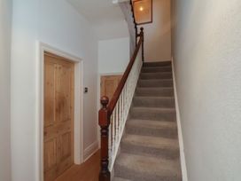 A staircase in a hallway at South Villa in Sandsend near Whitby