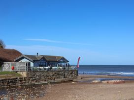 A building by the beach near the ocean at South Villa Sandsend near Whitby