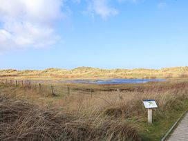A landscape with dunes and water at Dunes View in Prestatyn