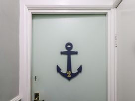 A door with an anchor and the number 2 at Apartment 2 in Scarborough
