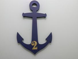 A decorative anchor with the number 2