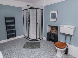 A bathroom with a shower and toilet at The Secret Garden in Narberth