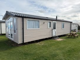 A mobile home with steps and a bench at Harlyn Hideaway (Swift Barritz) Padstow
