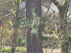 A sign indicating a wet suit wash area at N5 Ilfracombe