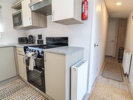 A kitchen with appliances and counter space at N5 Ilfracombe