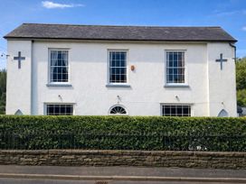 A building with windows and a door at Picton House near St Clears