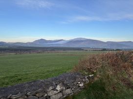 A view of mountains and fields at The Faithfuls Cabin in Dingle, County Kerry