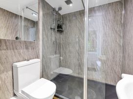 A bathroom with a shower and toilet at Oldfields