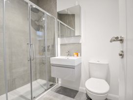 A bathroom with shower, toilet, and sink at 20 Meadow Retreat in Dobwalls