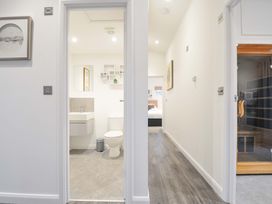 A hallway with a bathroom and bedroom view at 20 Meadow Retreat in Dobwalls