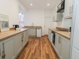 A kitchen with countertops and appliances at 93 Abbotsbury Road in Weymouth