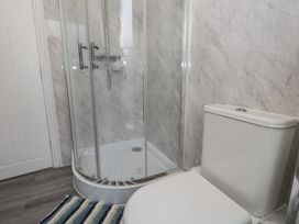 A bathroom with a shower and toilet at 93 Abbotsbury Road Weymouth
