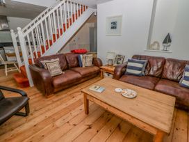 A living room with sofas and a coffee table at Rock House in Narberth
