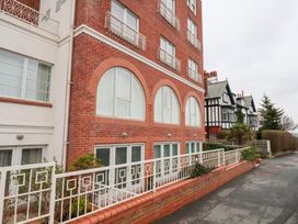 An exterior view of a residential building at One Union Mill - garden apartment Whitby