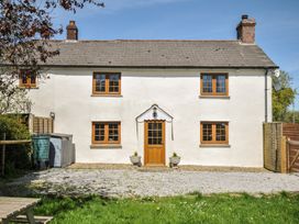 A house with a front door and windows at Little Blagdon in Ashwater