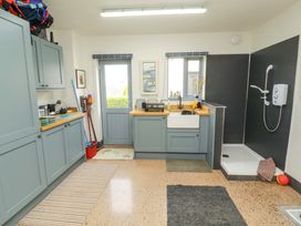 A kitchen with a sink and shower at Lakes View in Keswick