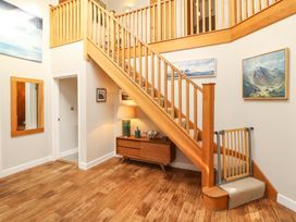 An entrance with a staircase and lamp at Lakes View in Keswick